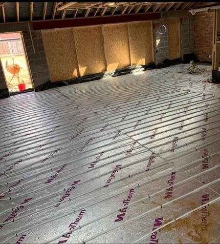Underfloor heating installation in progress